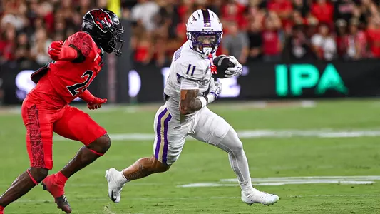 Noah Grevious runs after making a catch at San Diego State