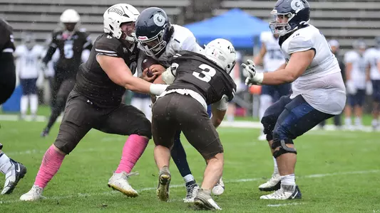 Burke Peltekian tackle