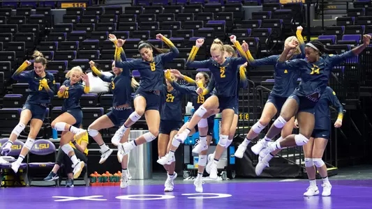 Volleyball Team Celebration Generic U-M Athletic Communications)