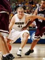 Kleiza scored 33 points against the Sooners