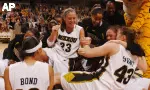 The Tigers celebrate Wednesday's upset win over No. 4 Baylor.