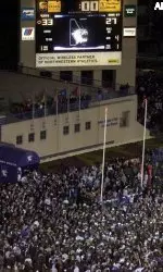 Northwestern and its fans celebrate the Wildcats win over Ohio State.
