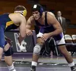 Junior Matt Delguyd helped the 'Cats with a 6-3 win in the 197 lb. weight class.