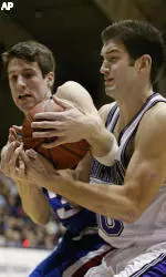 Tim Doyle and the 'Cats host Iowa Wednesday.