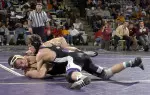 Redshirt freshman Jake Herbert (top) is 3-0 in duals this year and fresh off earning an individual title at the 42nd Midlands Championships.