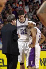 Davor Duvancic (middle) and Michael Jenkins (right) consult with Coach Carmody.