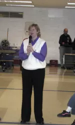 Head women's basketball coach Beth Combs speaks to students at John Middleton Elementary School.