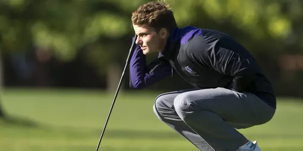 Ryan Lumsden lines up putt