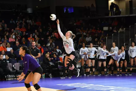 Britt Bommer serves against No. 4 Illinois