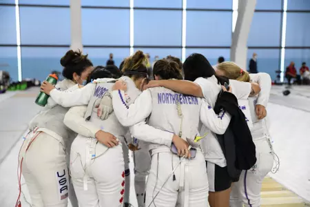 Women's Fencing Team Huddle