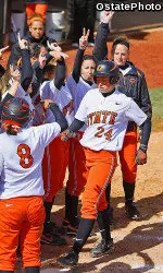Julie Ward steps on home plate following her home run against Auburn.