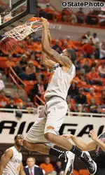 Michael Cobbins dunks for two points against the Texas Tech Red Raiders.