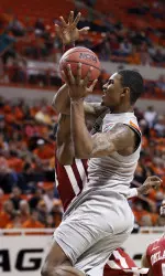 Le'Bryan Nash scored a game-high 21 points as OSU defeated OU in Bedlam action.