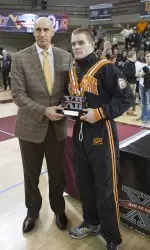 2014 Big 12 Outstanding Wrestler Chris Perry upsets top-ranked Andrew Howe to win fourth Big 12 title.