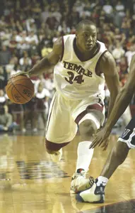 HAWKINS SETS TEMPLE RECORD WITH 28 POINTS TO LEAD OWLS TO 57-47 WIN AT FORDHAM IN MEN'S BASKETBALL Image