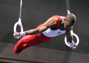 TEMPLE GYMNAST NYIKA WHITE FINISHES THIRD ON RINGS AT WINTER CUP CHALLENGE Image