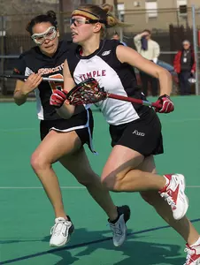 #5 VIRGINIA NARROWLY EDGES #20 WOMEN'S LACROSSE, 10-8 Image