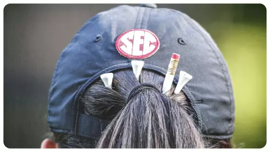 Back of a golfer's hat showing the SEC logo