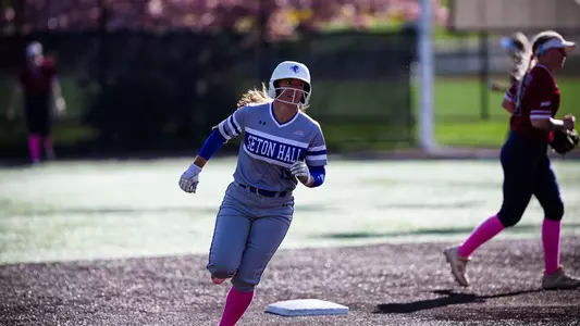 Abby Wingo running the bases