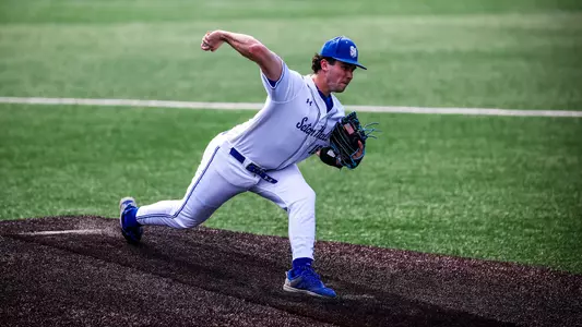 Ryan Reich throws a pitch against Monmouth on March 12