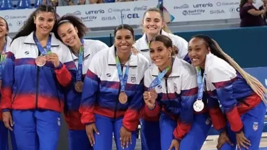 Kae Satterfield poses with her bronze medal from the Central America and Caribbean Games