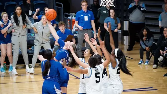 Faith Masonius flips the ball over her head to beat Villanova at the Buzzer on Jan. 1