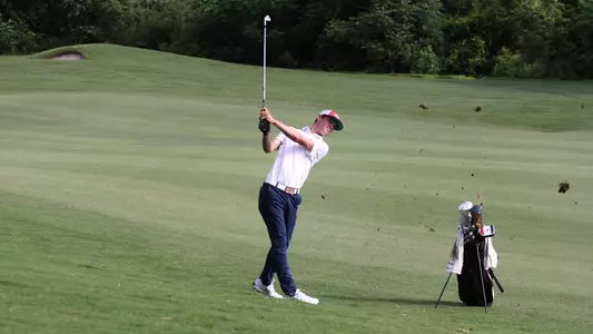 Ethan Farnam hits from the fairway at NCAA Regionals
