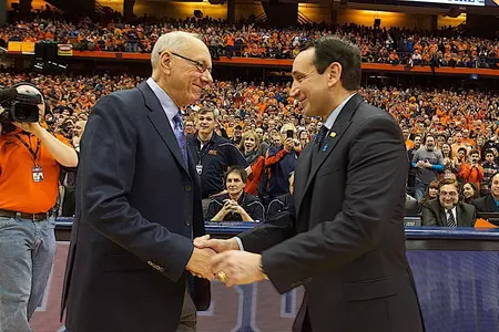 Jim Boeheim shakes hands with his opponent Duke coach Mike Krzyzewski.