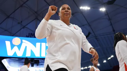 Felisha Legette-Jack acknowledges her family as she exits the court following a postseason win. 