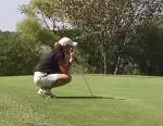 Melanie Hunt surveys her winning par putt on the first playoff hole of Tuesday's Big 12 Fall Preview.