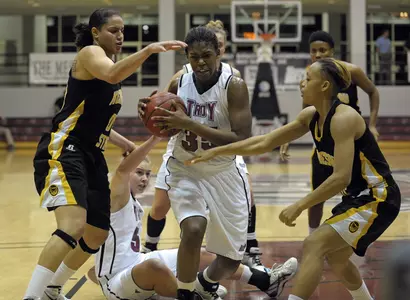 Trojans Fall to Owls in Final Non-Conference Matchup  Image