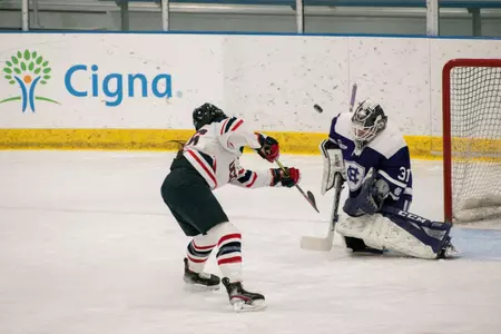 Danielle Fox takes a shot at close range against Holy Cross on February 12, 2021.