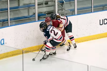 Morgan Wabick fights for the puck against BC on January 31, 2021.