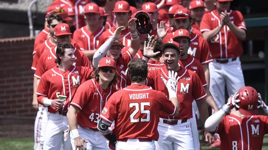 Justin Vought celebrates with teammates vs. Minnesota