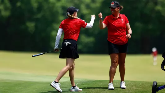 Angela Garvin and Kelly Hovland Fist Bump
