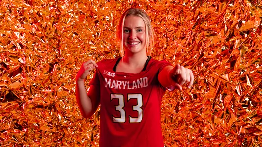 Caroline Ross red backdrop