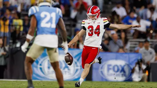 Bryce McFerson punting at UCLA during the 2025 season