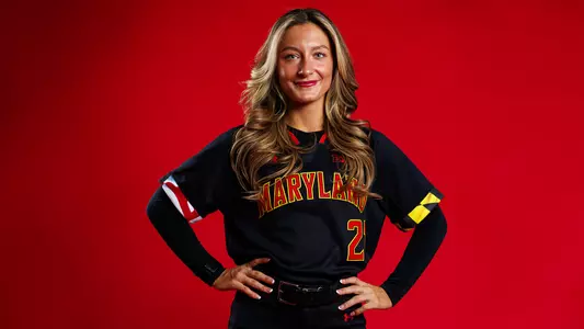 Lauren Caye Red background posed action photo