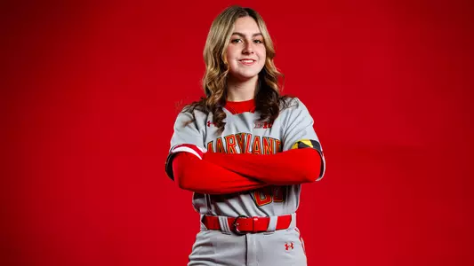 Caitlin olensky red background posed photo