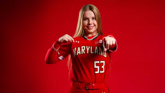 Sage Rodmyre red background posed photo