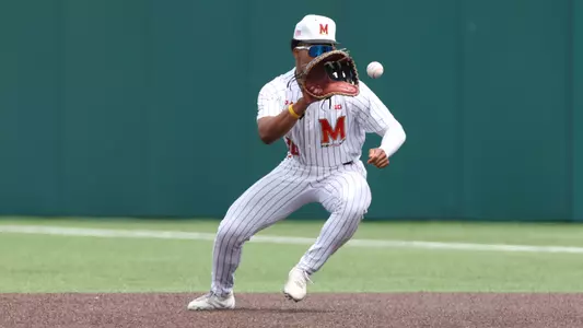 Paul Jones II fields a ground ball in a game against Michigan