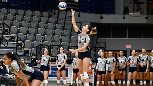 Julianna Askew serves the ball