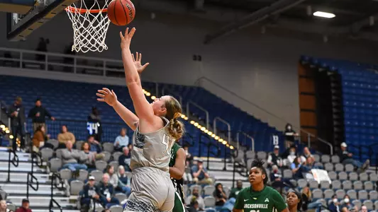 Emma Broermann shooting a layup