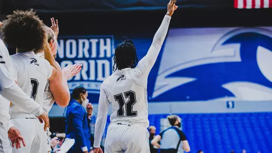 UNF women's basketball team action shot