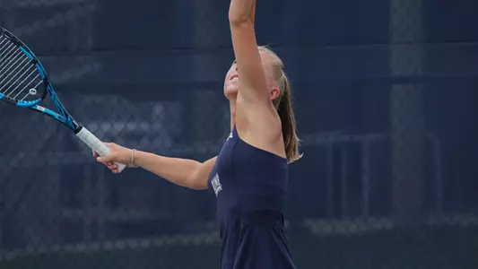 Megan Forster Serves the Ball
