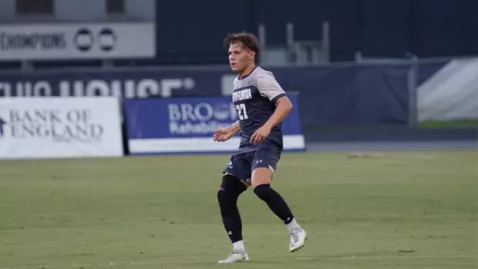 Ethan Ash back pedals to defense