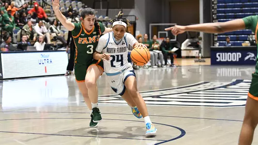 Jayla Adams driving ball against FAMU