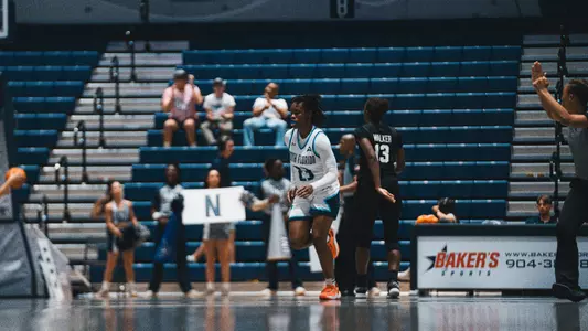 Kaila Rougier running down court