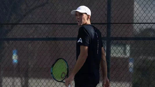 PJ Kotan action shot tennis