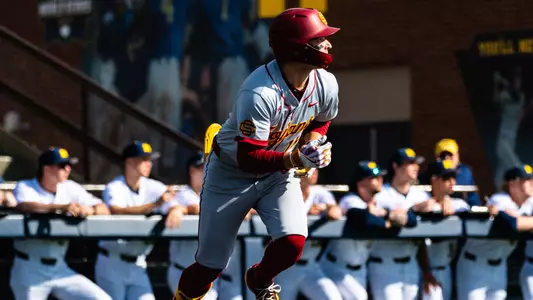 Brayden Dowd is captured mid-stride, running in the first game against Michigan.